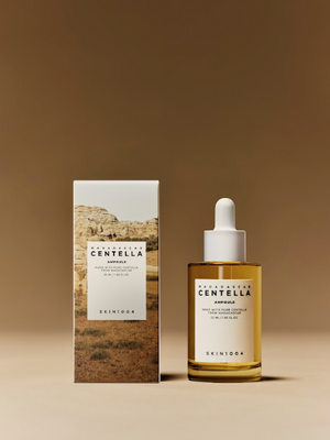 YABUKO SKIN1004 Madagascar Centella ampula, 55ml, ādas nomierinoša seruma pudelīte ar zaļām lapām un ampulām.