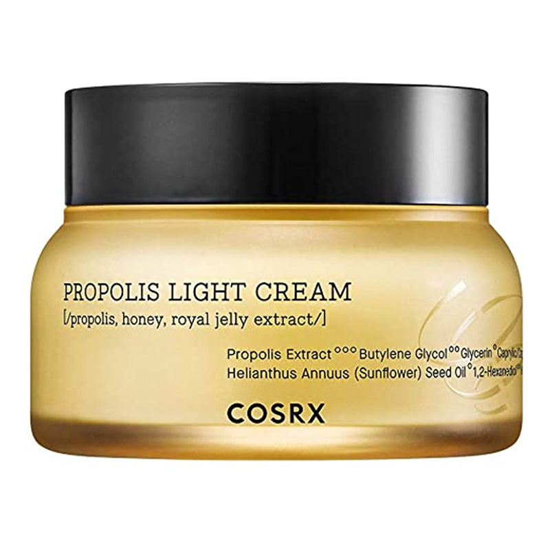 YABUKO COSRX Full Fit Propolis Light krēms sejas ādai ar dabīgām propolisa sastāvdaļām, iepakojumā, uz galda.
